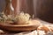 Beautiful dried flowers in glass jar on wooden tray on table indoors.