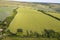 Beautiful drone landscape image over lush green Summer English countryside during late afternoon light