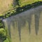 Beautiful drone landscape image over lush green Summer English countryside during late afternoon light