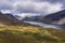 Beautiful drone view over Lake District landscape in late Summer, in Wast Water valley with mountain views and dramatic sky