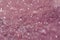 Beautiful druse of natural pink mineral amethyst close-up. Semiprecious stone background. Gem crystals
