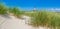 Beautiful dune landscape with traditional lighthouse at North Sea, Schleswig-Holstein, North Sea, Germany