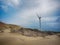 Beautiful dune and windmill in the beach dunes hill