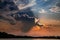 Beautiful dusk at the summer lake with dynamic clouds