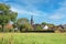 Beautiful dutch summer countryside landscape with rural village, church tower - Thorn (Limburg), Netherlands