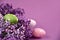 Beautiful Easter decoration with lilac and eggs stock images