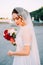 Beautiful eastern style bride with white veil and hairpiece