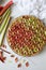 Beautiful elegant and delicious Rhubarb - Strawberry geometric pie against white background