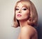 Beautiful elegant makeup woman with blond short hairstyle. Toned