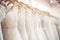 Beautiful elegant white luxury bridal dress on hangers. Generative AI