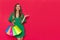 Beautiful Elegant Woman Is Holding Colorful Shopping Bags, Laughing And Presenting