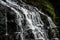 Beautiful Elephant Falls, the Three steps water falls, in Shillong, Meghalaya, East Khasi Hills, India