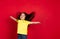 Beautiful emotional little girl  on red background. Half-lenght portrait of happy child gesturing