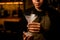 beautiful empty frosted martini wine glass in male hands