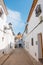 Beautiful empty typical narrow street in Altea`s historical center, Spain