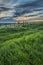 Beautiful English countryside landscape over fields at sunset