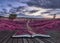 Beautiful English countryside landscape over fields at sunset wi