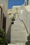 Beautiful Entrance Through A Stairs To One Of The Churches Of The Beautiful City Of Fira On The Island Of Santorini. Architecture,