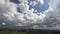 Beautiful epic cinematic view of valley, Gumbashi Pass. Clouds, mountains, rain