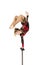 Beautiful equilibrist in a red and black suit, performs exercises on acrobatic canes