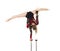 Beautiful equilibrist in a red and black suit, performs exercises on acrobatic canes