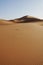 Beautiful Erg Chigaga dune on Sahara desert in MOROCCO - vertical