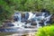 Beautiful Eubiose waterfall in the forest, São Thomé das Letras, Brasil.