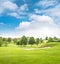 Beautiful european landscape. Spring green field and blue sky