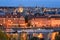 Beautiful evening roof view on Tyn Church, Vltava river and Old Town Square, Prague, Czech Republic.