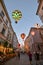 Beautiful evening street, glowing balloons and old bright buildings in the old town of Lublin, Poland