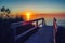 Beautiful evening sunset landscape at Canadian Ontario lake Huron in Pinery Park, orange blue red sky sun