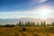 Beautiful evening view with cropped fields and mountains