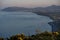 Beautiful evening view of Killiney Beach, Bray Head, Little Sugar Loaf and gorse Ulex flowers seen from Killiney Hill, Dublin