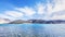 Beautiful exotic summer landscape of blue sky mountain and lake with reflection of cloud