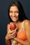 Beautiful exotic woman with apple