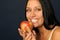 Beautiful exotic woman with apple