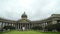 Beautiful facade of Kazan Cathedral with tourists. Action. Many tourists relax at popular architectural landmark of St