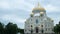 Beautiful facade of the white Cathedral with Golden domes on background cloudy sky. Concept. Popular Russian Cathedral