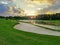 Beautiful fairway sand bunkers and lake in the golf course