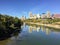 A beautiful fall view of the downtown skyline of Edmonton, reflecting in the North Saskatchewan River below.