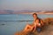 Beautiful family enjoying the evening on beach