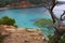 The beautiful and famous bay of cala saladeta of ibiza seen from above or rocky inlet between the rocks and the vegetation of the