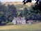 A beautiful farmhouse, with Dartmoor hills in the background