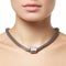 Beautiful fashion necklace on the neck. Jewellery and bijouterie