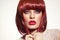 Beautiful fashion redhead girl with bob haircut and stylish make