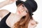 Beautiful fashion teen in makeup and hat