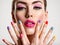 Beautiful fashion woman with a colored nails. Attractive white girl with multicolor manicure