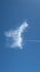 Beautiful feathery cloud looking like hanging on a clothesline