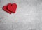 Beautiful felt hearts and concrete background