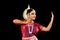 Beautiful Female Classical Odissi dancer performing Odissi Dance on stage in special attire at Konark Temple, Odisha, India.
